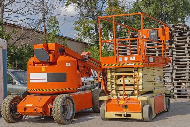 forklift lifting materials in a shipping warehouse in Stoneham